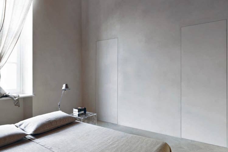 Puertas minimalistas ocultas en la pared
